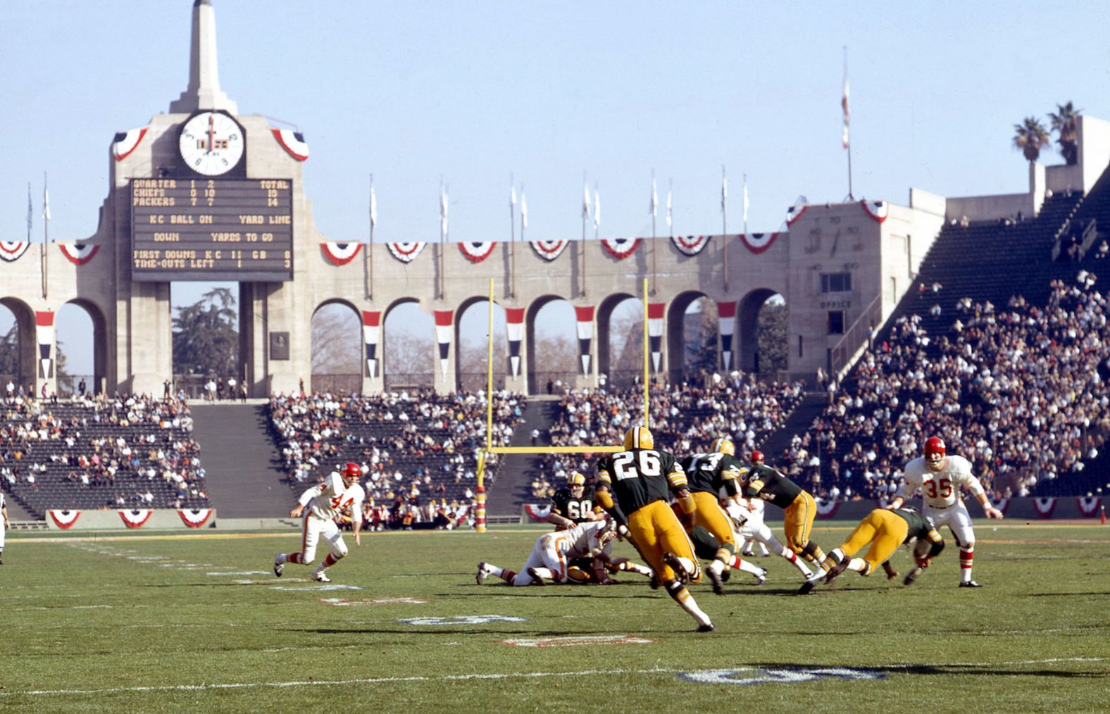 Herb Adderley (No. 26) returns a kickoff during the game. Adderley, a Hall of Fame cornerback, played nine seasons with the Packers.