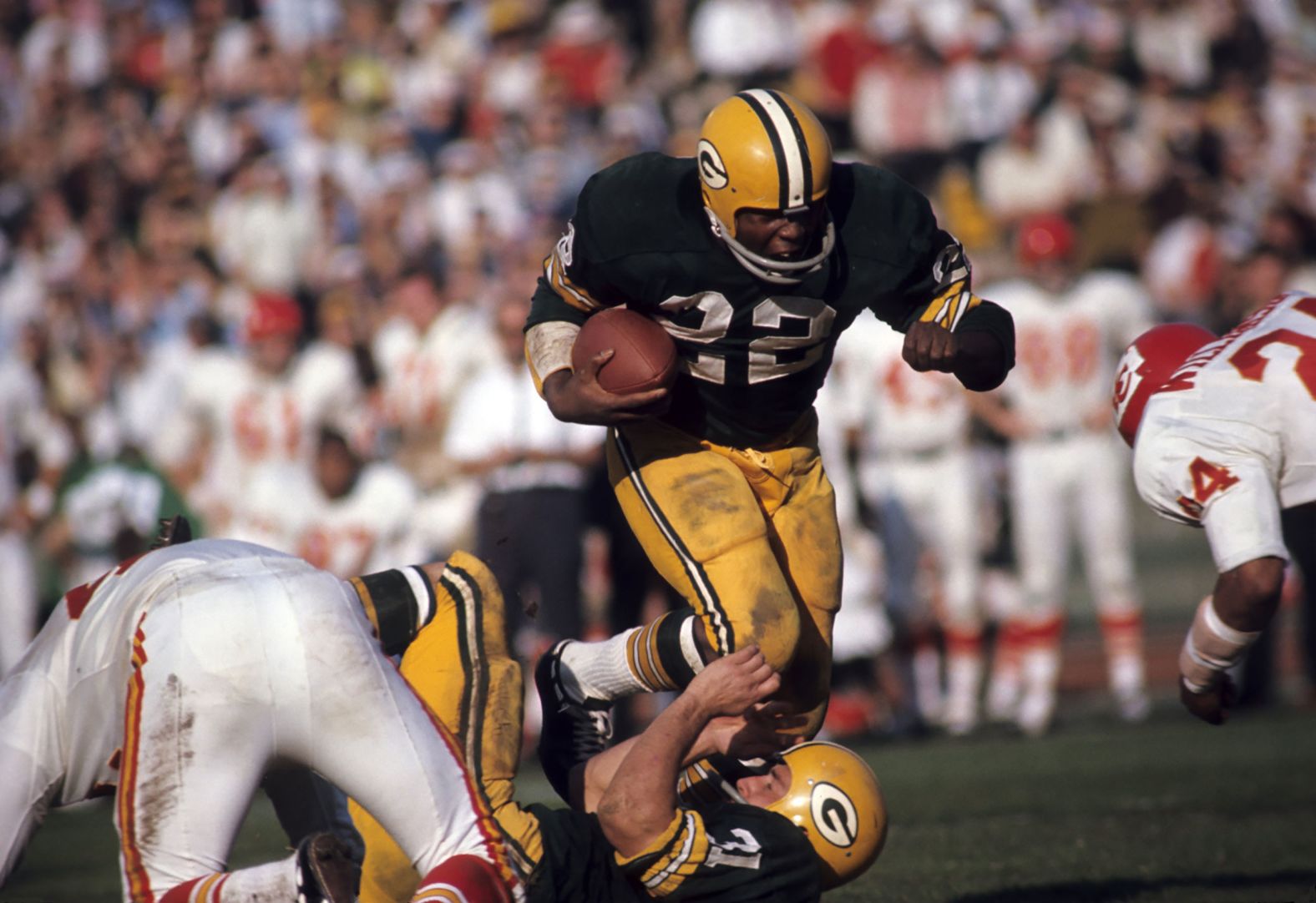 Running back Elijah Pitts carries the ball for the Packers. He scored two touchdowns in the game.