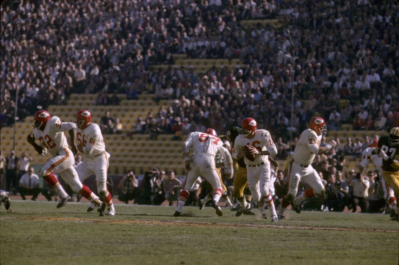 Chiefs quarterback Len Dawson rolls out for a pass. Nearly 62,000 fans attended the game, but there were still a lot of empty seats. Now the Super Bowl is one of the most coveted tickets in sports.