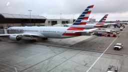 American Airlines jets sits at a gate at Los Angeles International Airport on May 24, 2018. (Photo credit should read DANIEL SLIM/AFP via Getty Images)