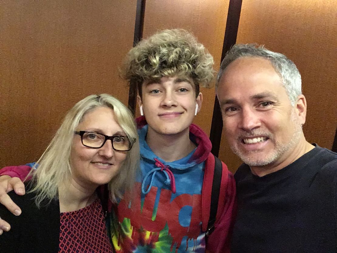 TikTok star Luca Schaefer-Charlton, center, with his parents  Tordes and Martin.  