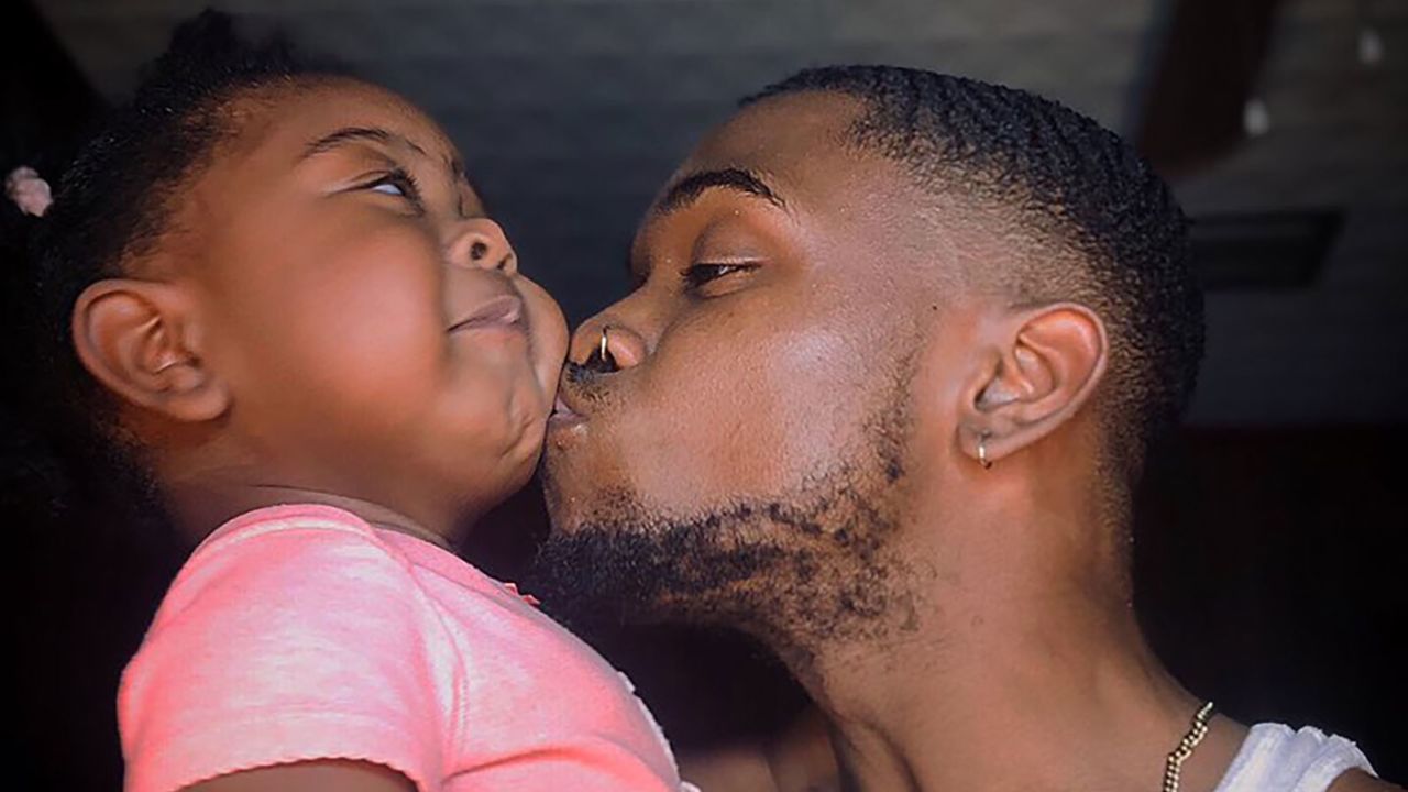 Frank Winn with one of his daughters.
