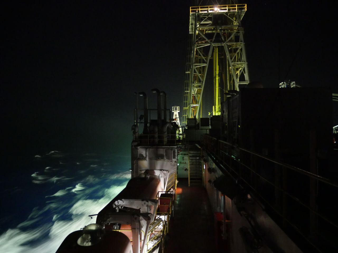 The Resolution at night sailing to the Bengal Fan, Bay of Bengal in 2015. Expeditions are typically around two months, and the crew work 12-hour shifts, seven days a week during drilling operations.