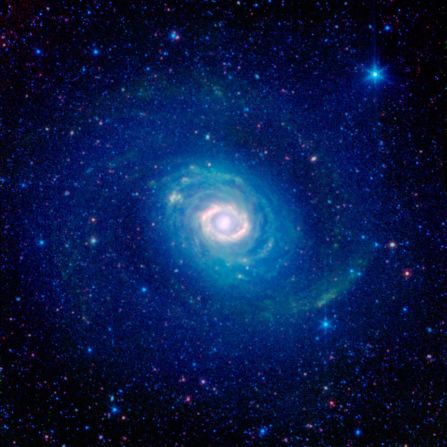 Messier 94 is a stunning galaxy about 17 million light years away. This Spitzer image showcases what appears to be multiple rings, but astronomers think it's an optical illusion and that there's really just one. 