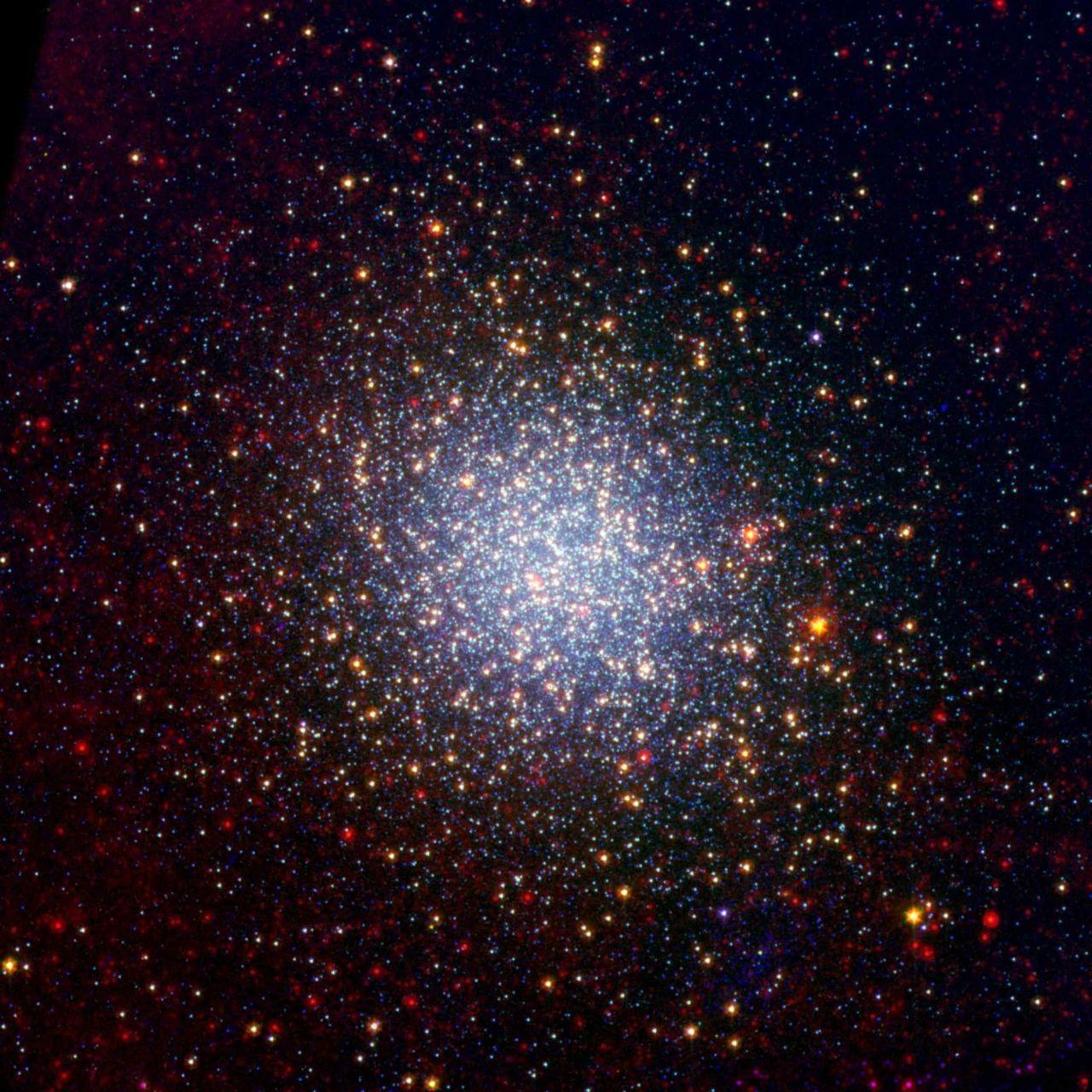 This star cluster called Omega Centauri, imaged by Spitzer, is home to millions of stars.