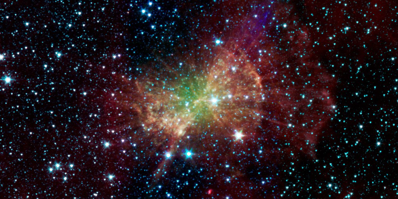 The Dumbbell nebula is what's left after a star similar to our sun exploded. The details of it are revealed in infrared by Spitzer. 