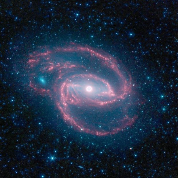 This coiled galaxy looks like a literal eye in the sky, through Spitzer's perspective. 