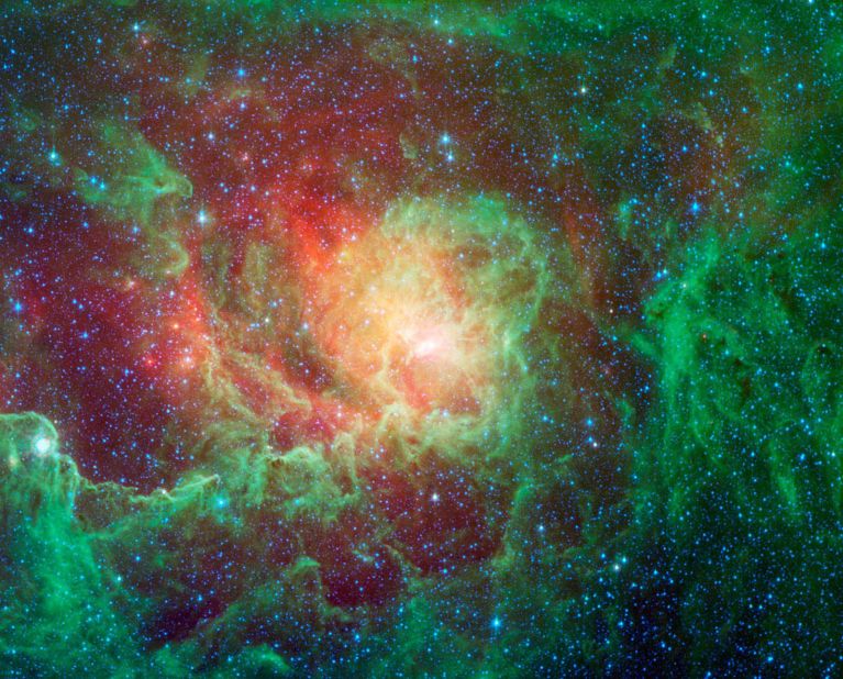 Spitzer highlighted dust clouds and newborn stars in this image of the "Lagoon nebula." Astronomers estimate it to be between 4,000 and 6,000 light-years away, lying in the general direction of the center of our galaxy in the constellation Sagittarius.