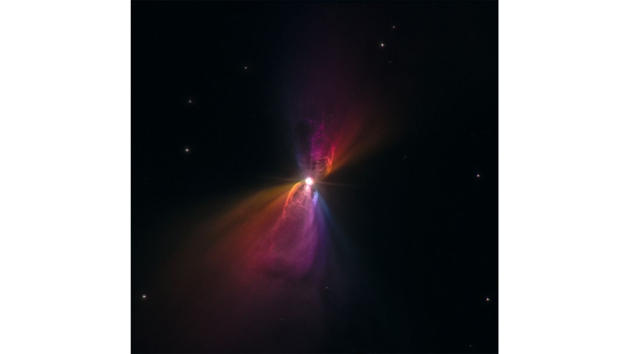 "Boomerang Nebula Hubble" -- A Hubble image of the Boomerang Nebula. The Boomerang Nebula is about 5,000 light-years from Earth. Its temperature is around -460 degrees Fahrenheit.