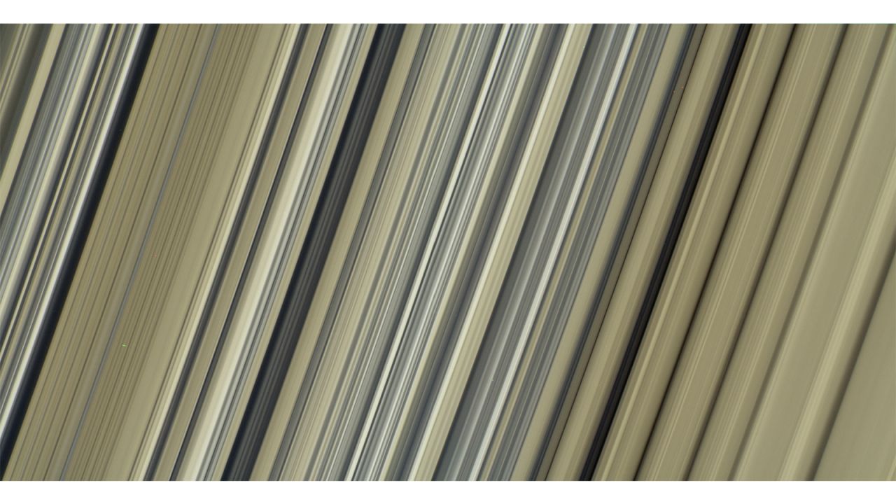 "PIA21628_figA" -- Processed directly for NASA/JPL. The closest full color view of Saturn's rings taken by Cassini. Saturn's icy rings are thought to be pieces of comets, asteroids or shattered moons that broke up before they reached the planet.