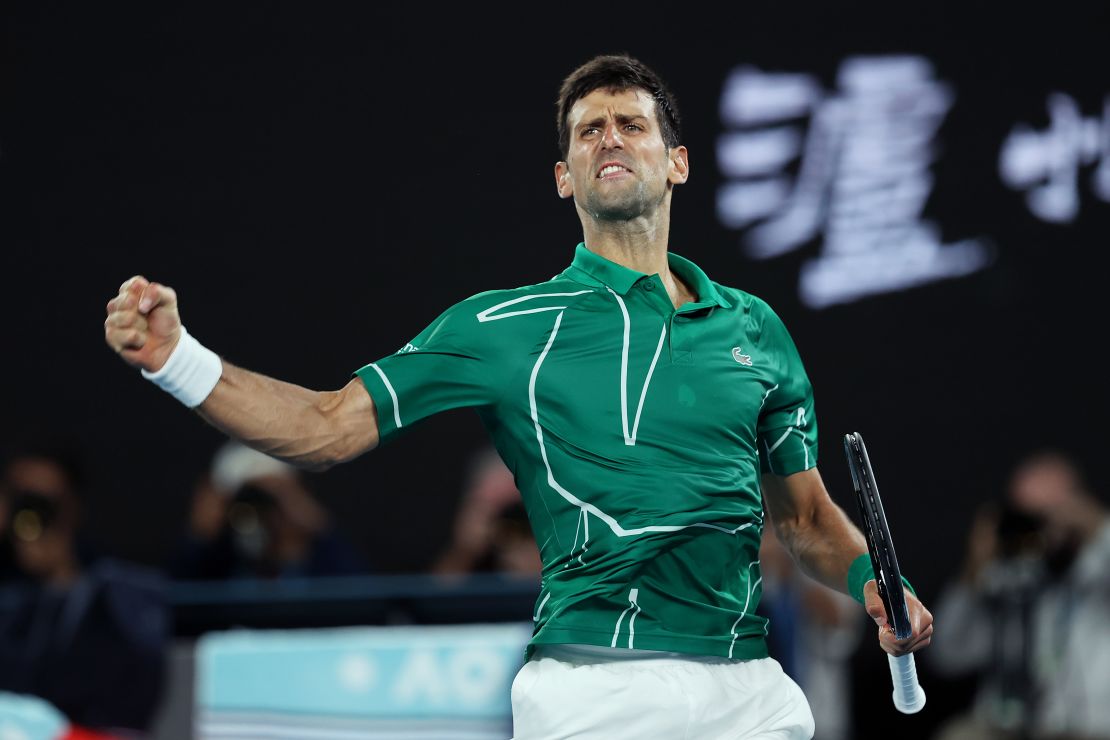 Novak Djokovic celebrates after clinching the second set against Roger Federer. 