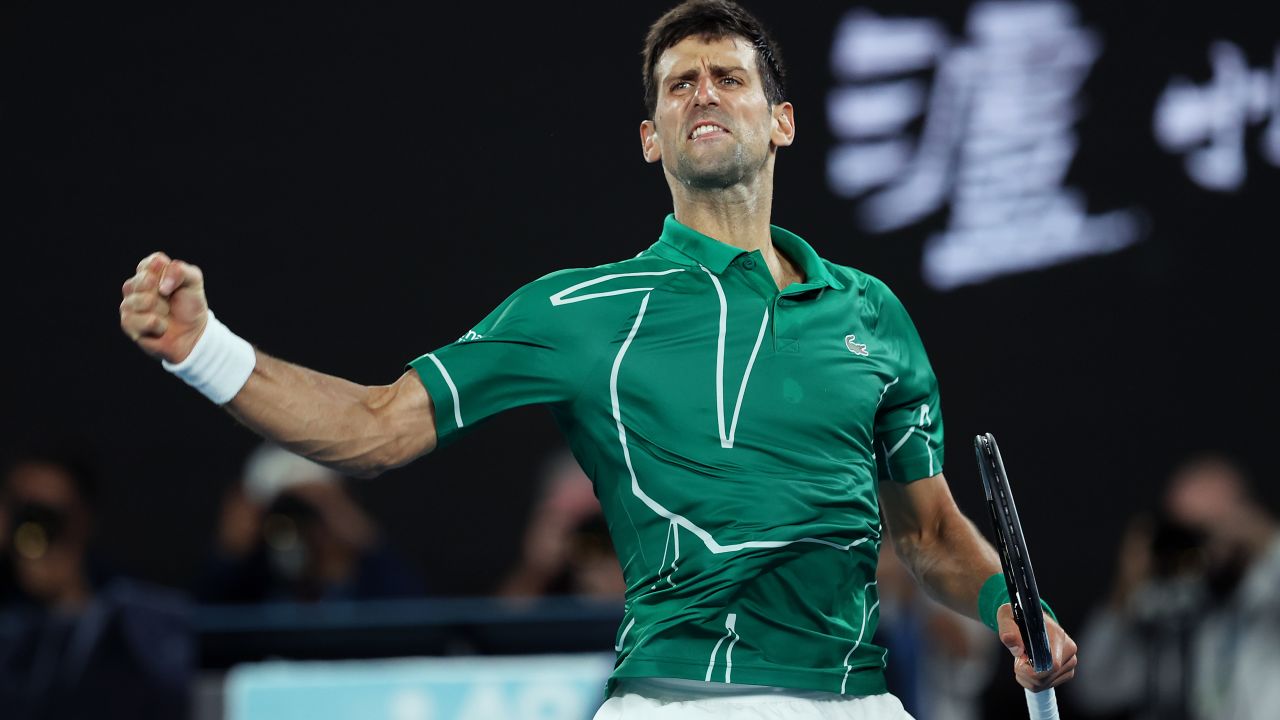 Novak Djokovic celebrates after clinching the second set against Roger Federer. 