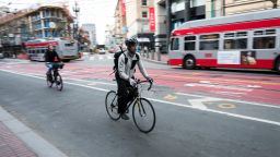 Bicyclists ride on Market Street in San Francisco, California, U.S., on Wednesday, Jan. 15, 2020. Passenger cars and ride-hailing services will be indefinitely prohibited from traveling on portions of Market Street, the major thoroughfare in the city's Financial District, though they'll still be able to cross it. Photographer: David Paul Morris/Bloomberg/Getty Images