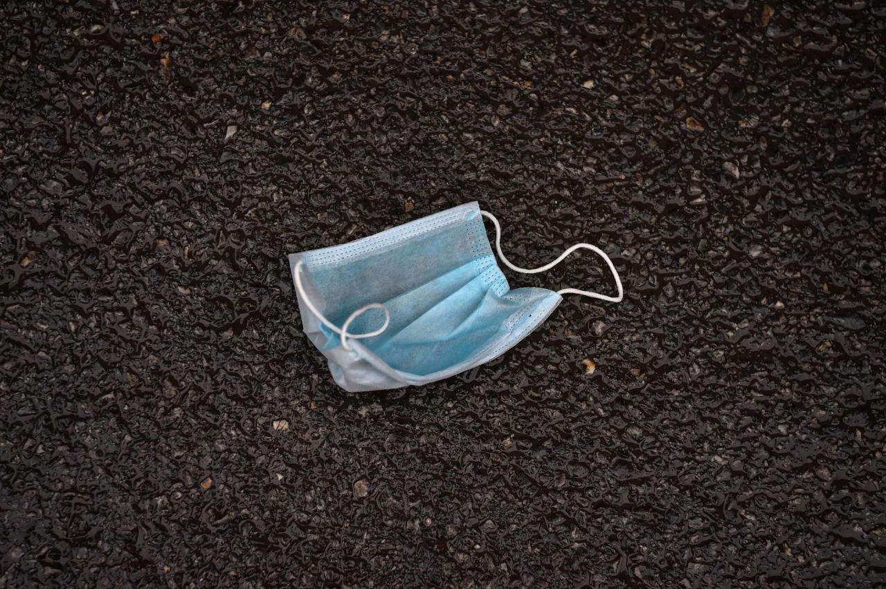 A discarded face mask rests on a street in Wuhan on January 26.