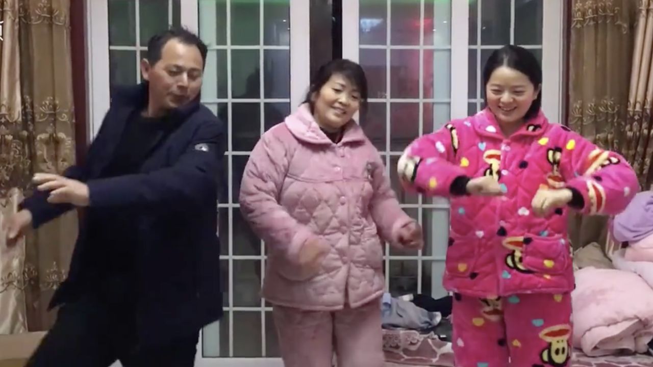 Living under lockdown, Wuhan resident Mr. Zhang has brought "square dancing" into his living room.