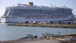 The Costa Smeralda cruise ship is docked in the Civitavecchia port near Rome, Thursday, Jan. 30, 2020. Italian health authorities are keeping some 7,000 people aboard after a passenger from Macao came down with flu-like symptoms, amid the global scare about a new virus. Passengers are being kept on board pending check to determine the type of virus. (AP Photo/Andrew Medichini)