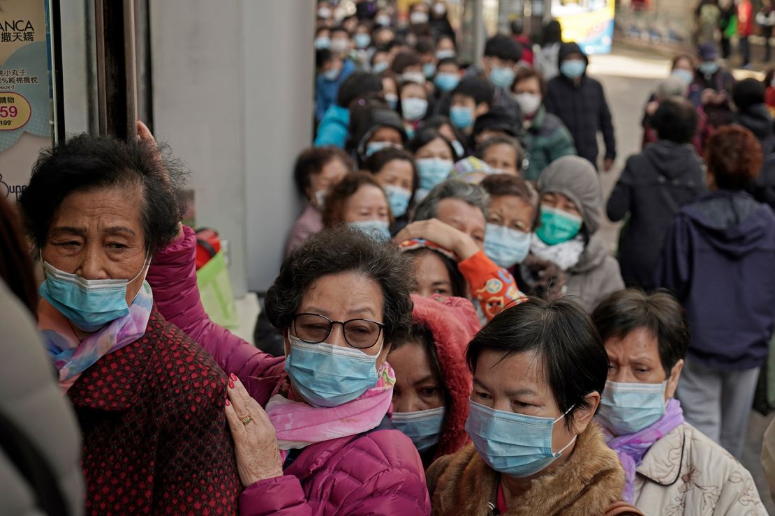 People line up to buy face masks in Hong Kong on Januar 30, 2020. 