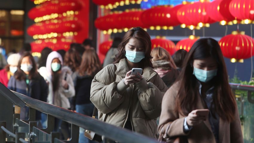 People wear face masks and walk at a shopping mall in Taipei, Taiwan, Friday, Jan. 31, 2020. People wear face masks as they walk through a shopping mall in Taipei, Taiwan, Friday, Jan. 31, 2020. According to the Taiwan Centers of Disease Control (CDC) Friday, the tenth case diagnosed with the new coronavirus has been confirmed in Taiwan. (AP Photo/Chiang Ying-ying)