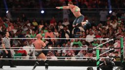 TOPSHOT - John Cena (R) competes with Triple H during the World Wrestling Entertainment (WWE) Greatest Royal Rumble event in the Saudi coastal city of Jeddah on April 27, 2018. (Photo credit should read STRINGER/AFP via Getty Images)