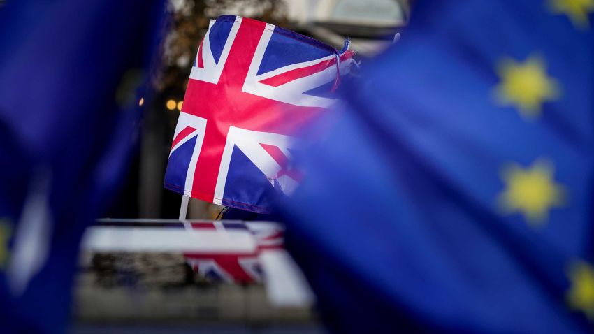 A picture taken on January 30, 2020 shows a Union Jack during a protest against Brexit near the European Parliament in Brussels. - Britain's departure from the European Union was set in law on January 29, amid emotional scenes, as the bloc's parliament voted to ratify the divorce papers. After half a century of sometimes awkward membership and three years of tense withdrawal talks, the UK will leave the EU at midnight Brussels time (2300 GMT) on January 31, 2020. (Photo by Kenzo TRIBOUILLARD / AFP) (Photo by KENZO TRIBOUILLARD/AFP via Getty Images)