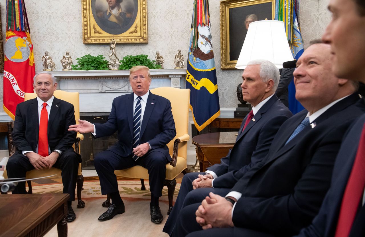 Trump meets with Israeli Prime Minister Benjamin Netanyahu, left, in the White House Oval Office in January 2020. At right is Vice President Mike Pence and Secretary of State Mike Pompeo.