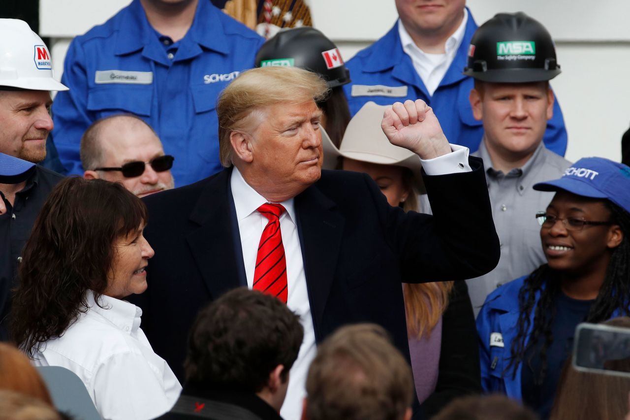 Trump pumps his fist after <a href="https://www.cnn.com/2020/01/29/politics/donald-trump-usmca-trade-deal/index.html" target="_blank">signing a new North American trade agreement</a> in January 2020. The US-Mexico-Canada Agreement replaces the North American Free Trade Agreement, which Trump railed against during the 2016 campaign.