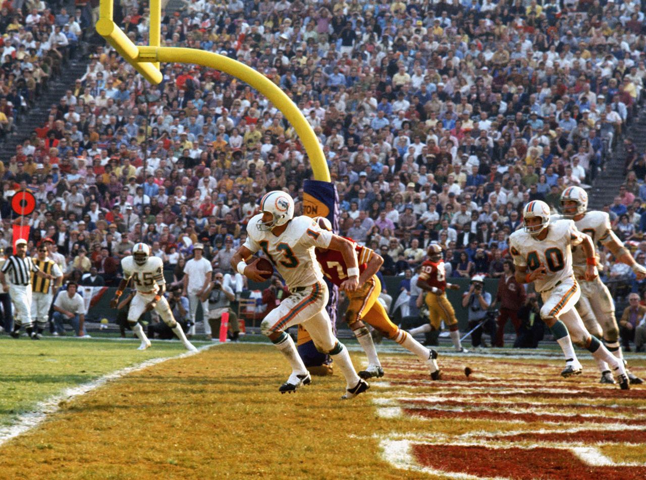 <strong>Super Bowl VII (1973):</strong> Miami safety Jake Scott intercepts a fourth-quarter pass in the end zone during the Dolphins' 14-7 win over Washington in Super Bowl VII. Scott had two interceptions in the game as the Dolphins finished their season with a perfect 17-0 record. They are still the only NFL team ever to finish a season undefeated.