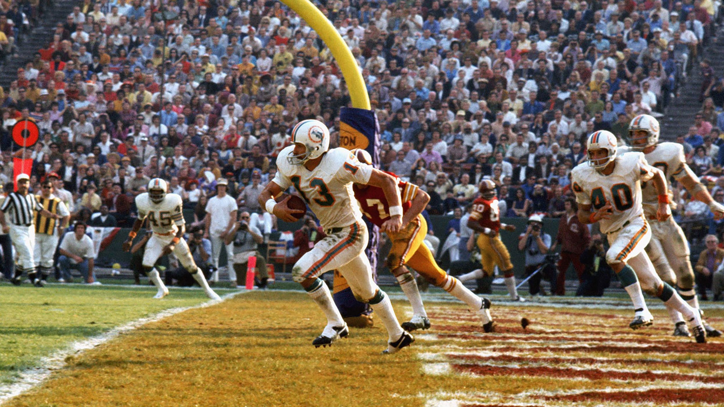 <strong>Super Bowl VII (1973):</strong> Miami safety Jake Scott intercepts a fourth-quarter pass in the end zone during the Dolphins' 14-7 win over Washington in Super Bowl VII. Scott had two interceptions in the game as the Dolphins finished their season with a perfect 17-0 record. They are still the only NFL team ever to finish a season undefeated.