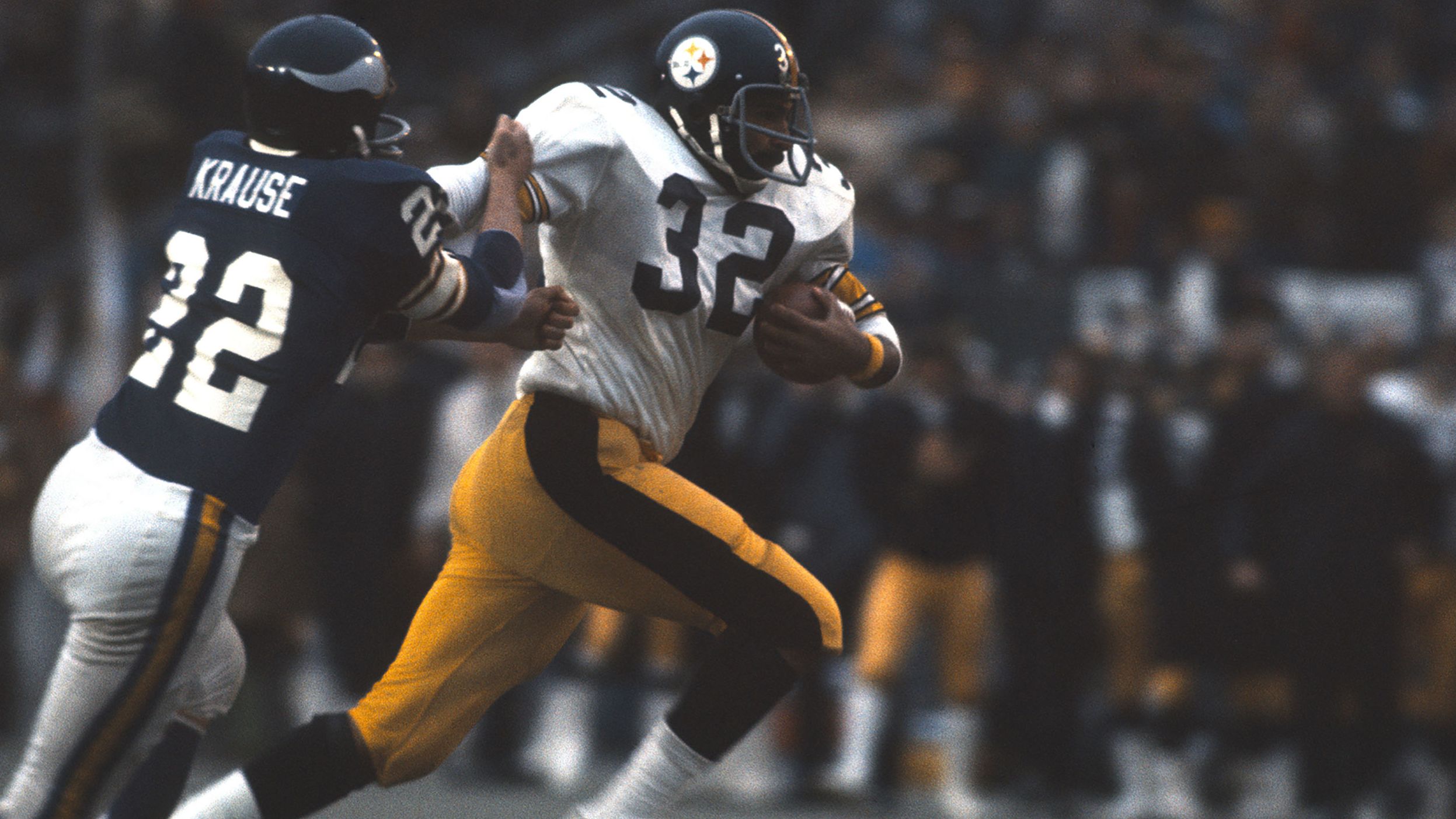 <strong>Super Bowl IX (1975):</strong> Pittsburgh Steelers running back Franco Harris fights off Minnesota defender Paul Krause during Pittsburgh's 16-6 victory in Super Bowl IX. Harris ran for 158 yards and a touchdown on his way to winning MVP.