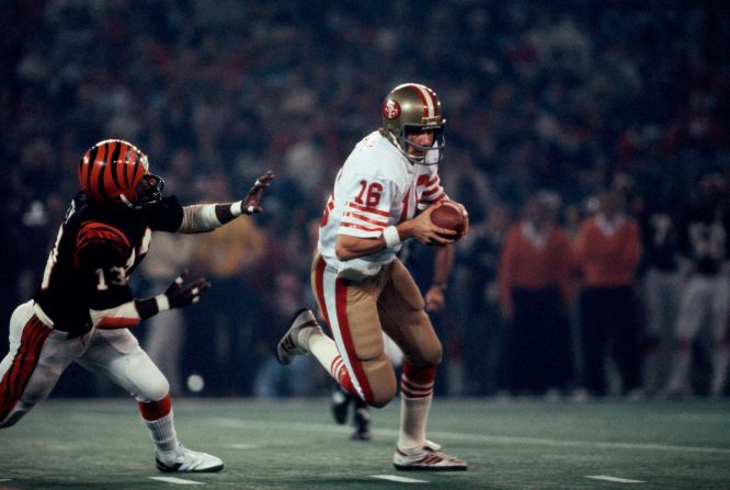 <strong>Super Bowl XVI (1982):</strong> San Francisco 49ers quarterback Joe Montana evades a tackle en route to winning MVP honors in Super Bowl XVI. Montana threw for one touchdown in the game and ran for another as the 49ers won 26-21.