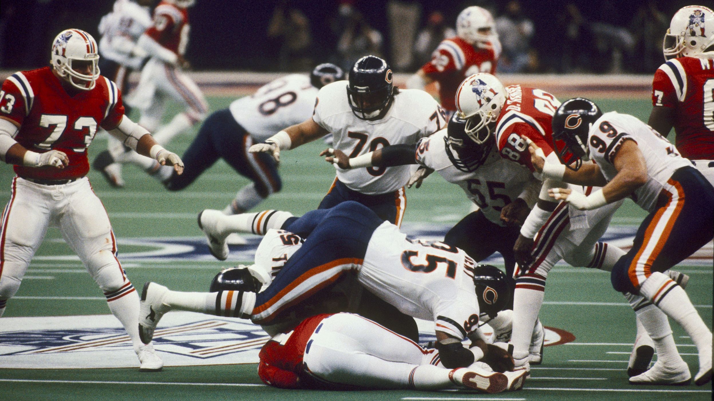 <strong>Super Bowl XX (1986):</strong> Chicago Bears defensive end Richard Dent (No. 95) sacks New England quarterback Steve Grogan during Super Bowl XX. Dent had two sacks and two forced fumbles as a devastating defense helped Chicago crush the Patriots 46-10.