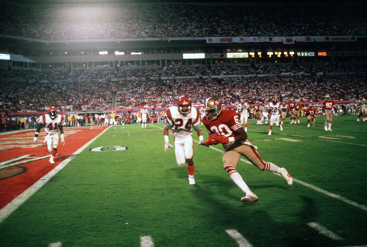 <strong>Super Bowl XXIII (1989):</strong> San Francisco wide receiver Jerry Rice runs toward the goal line while playing Cincinnati in Super Bowl XXIII. Rice finished with 11 receptions for a Super Bowl-record 215 yards.