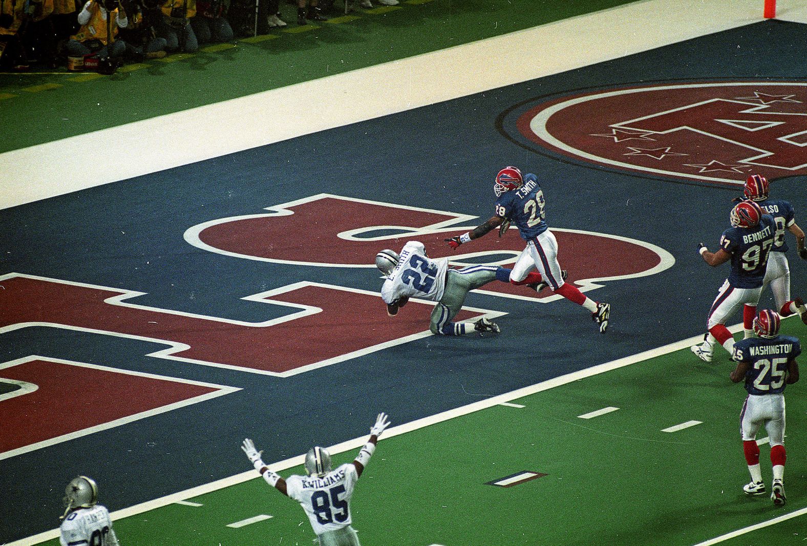 <strong>Super Bowl XXVIII (1994):</strong> Dallas running back Emmitt Smith scores against Buffalo in Super Bowl XXVIII. Smith rushed for 132 yards and three touchdowns as Dallas won 30-13 in a Super Bowl rematch from one year earlier.