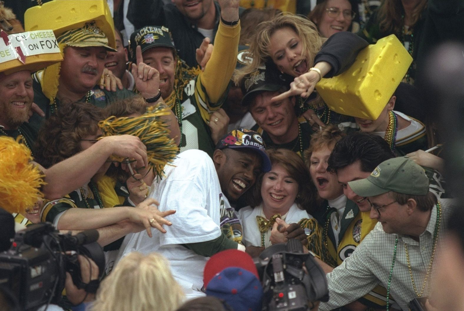 <strong>Super Bowl XXXI (1997):</strong> Super Bowl MVP Desmond Howard jumps into a crowd of Green Bay Packers fans after the Packers defeated New England 35-21 in Super Bowl XXXI. Howard had 244 all-purpose yards, including a 99-yard kickoff return for a touchdown.