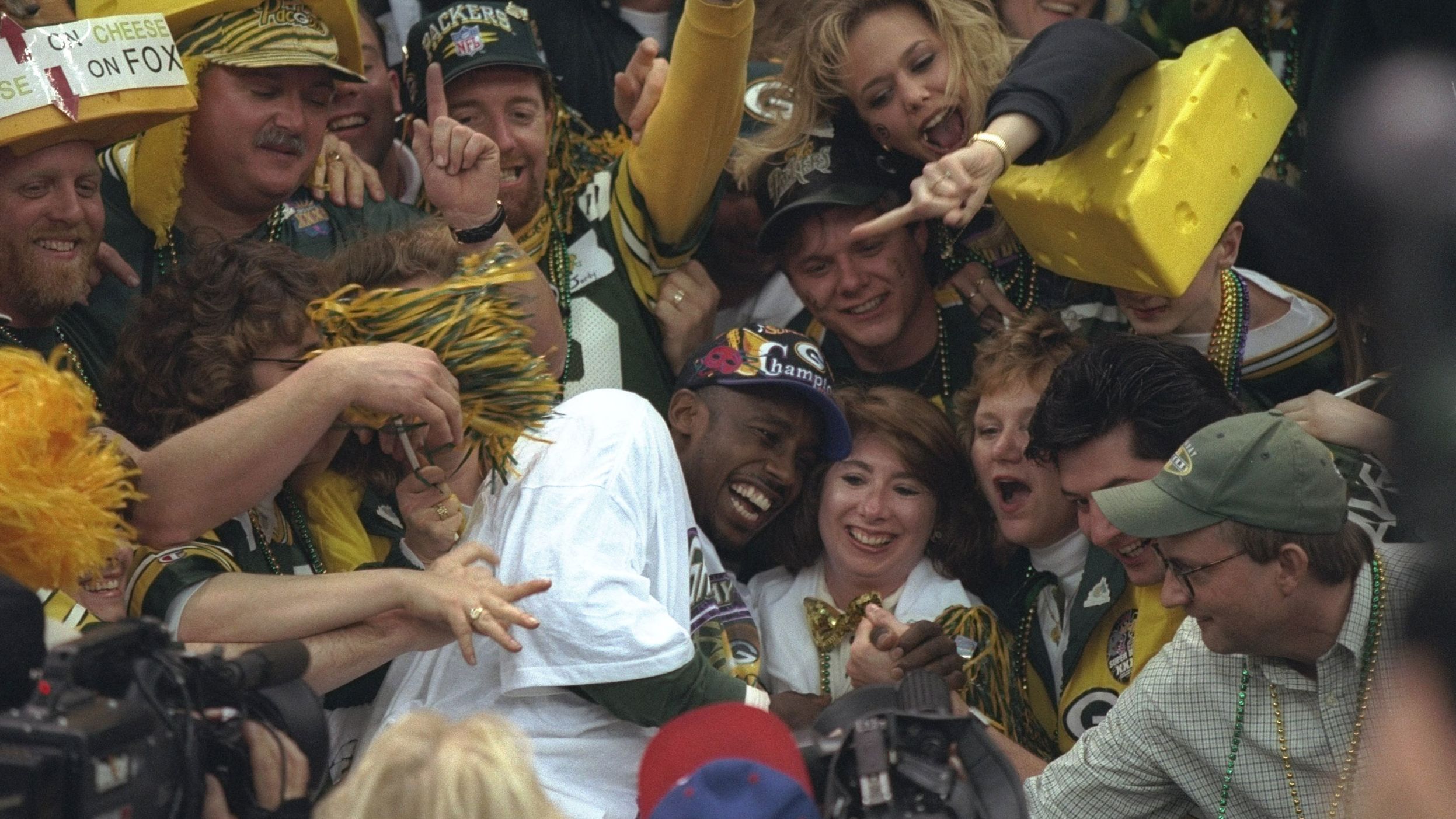 <strong>Super Bowl XXXI (1997):</strong> Super Bowl MVP Desmond Howard jumps into a crowd of Green Bay Packers fans after the Packers defeated New England 35-21 in Super Bowl XXXI. Howard had 244 all-purpose yards, including a 99-yard kickoff return for a touchdown.