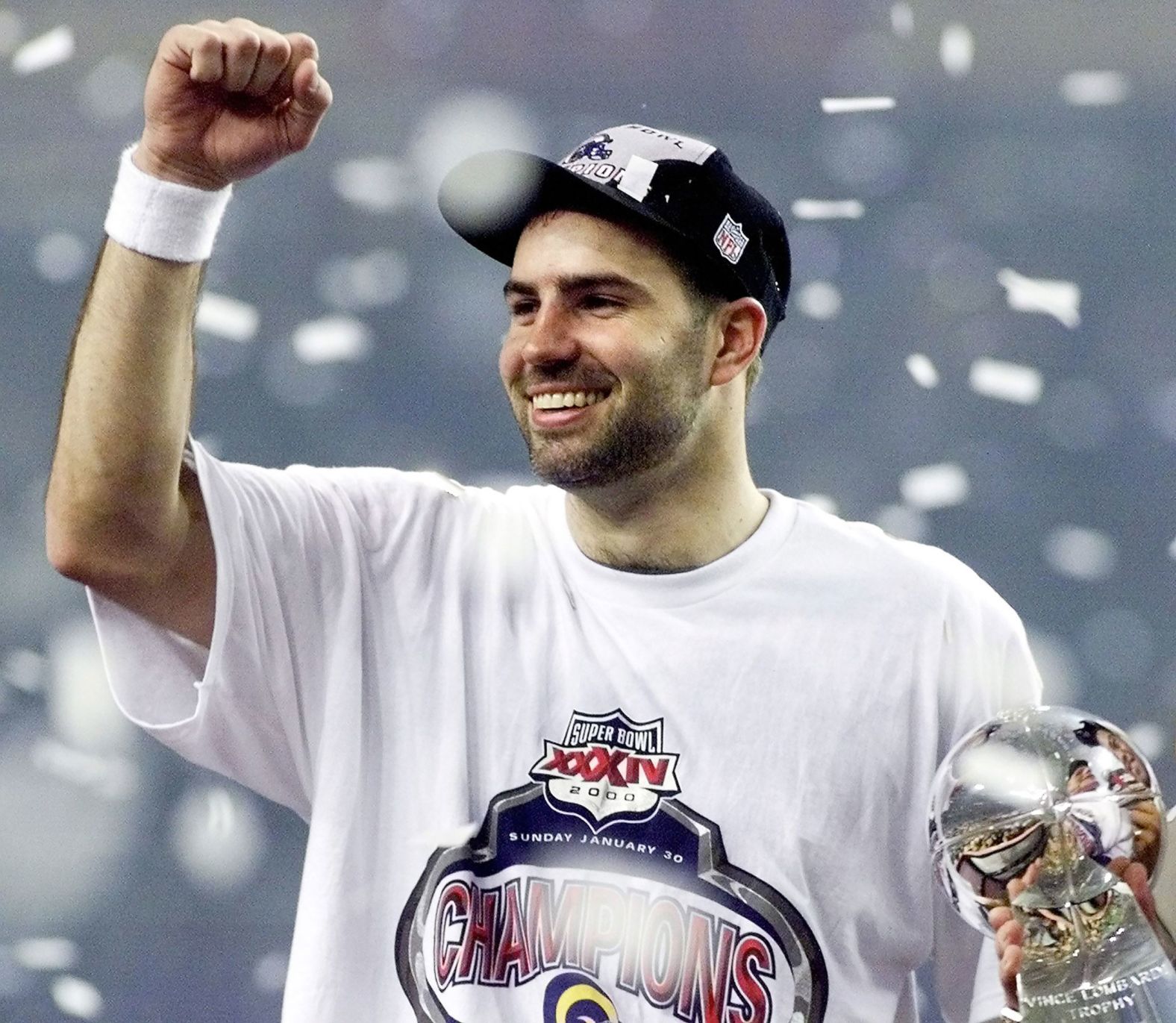 <strong>Super Bowl XXXIV (2000):</strong> MVP quarterback Kurt Warner celebrates after leading the St. Louis Rams to a 23-16 victory over Tennessee in Super Bowl XXXIV. Warner threw for a Super Bowl-record 414 yards, leading an offense that had been nicknamed "The Greatest Show on Turf."