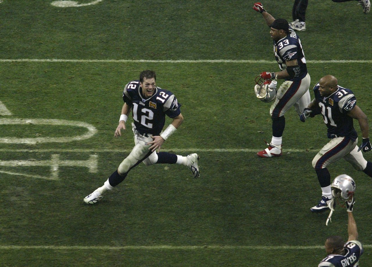 <strong>Super Bowl XXXVIII (2004):</strong> New England quarterback Tom Brady, left, celebrates with teammates after winning a second Super Bowl in three years. Brady was MVP again, throwing for 354 yards and three touchdowns as the Patriots defeated the Carolina Panthers 32-29.