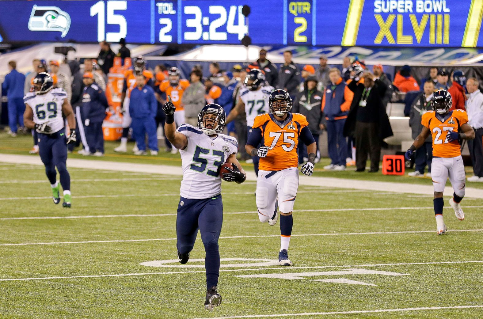 <strong>Super Bowl XLVIII (2014):</strong> Seattle Seahawks linebacker Malcolm Smith runs an interception back for a touchdown during Seattle's 43-8 drubbing of Denver in Super Bowl XLVIII. Smith and Seattle's "Legion of Boom" defense stifled Peyton Manning and Denver's No. 1-rated offense.