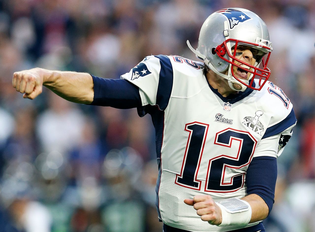 <strong>Super Bowl XLIX (2015):</strong> New England's Tom Brady pumps his fist after throwing one of his four touchdown passes in the Patriots' 28-24 victory over Seattle. Brady joined Joe Montana as the only players to win three Super Bowl MVPs.