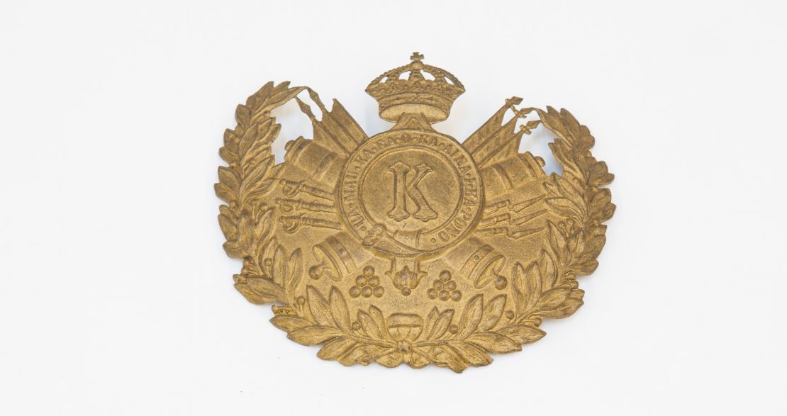 The helmet plaque from the Prince's Own, a volunteer uniformed artillery unit.