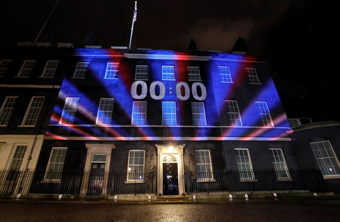 A digital Brexit countdown clock projected on to the front of 10 Downing Street showed 00:00 as the UK left the EU at 11 p.m. Friday local time.