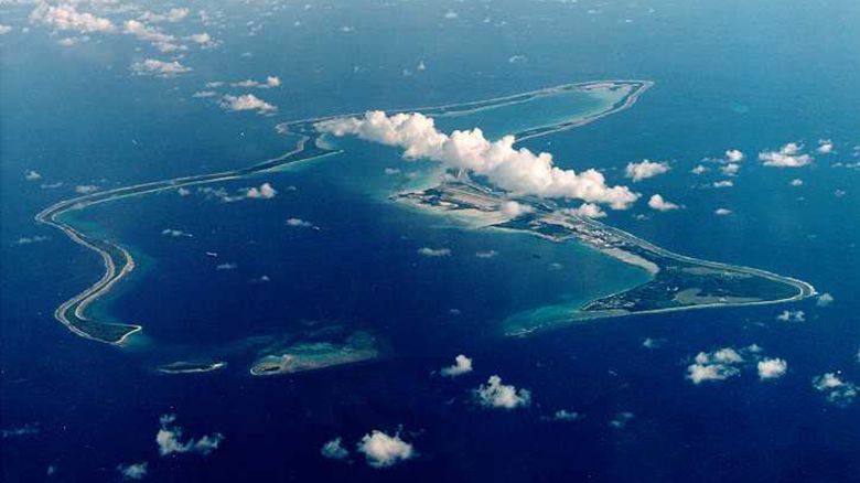 An undated file photo shows Diego Garcia, the largest island in the
Chagos archipelago and site of a major United States military base in
the middle of the Indian Ocean leased from Britain in 1966. The United
States is preparing to deploy heavy B-2 bombers to Britian and the
Indian Ocean Island of Diego Garcia, if necessary in time to lead an
attack on Iraq, the officer in charge of the fleet said on October 30
2002. REUTERS/HO/U.S. Navy

CLH/JS