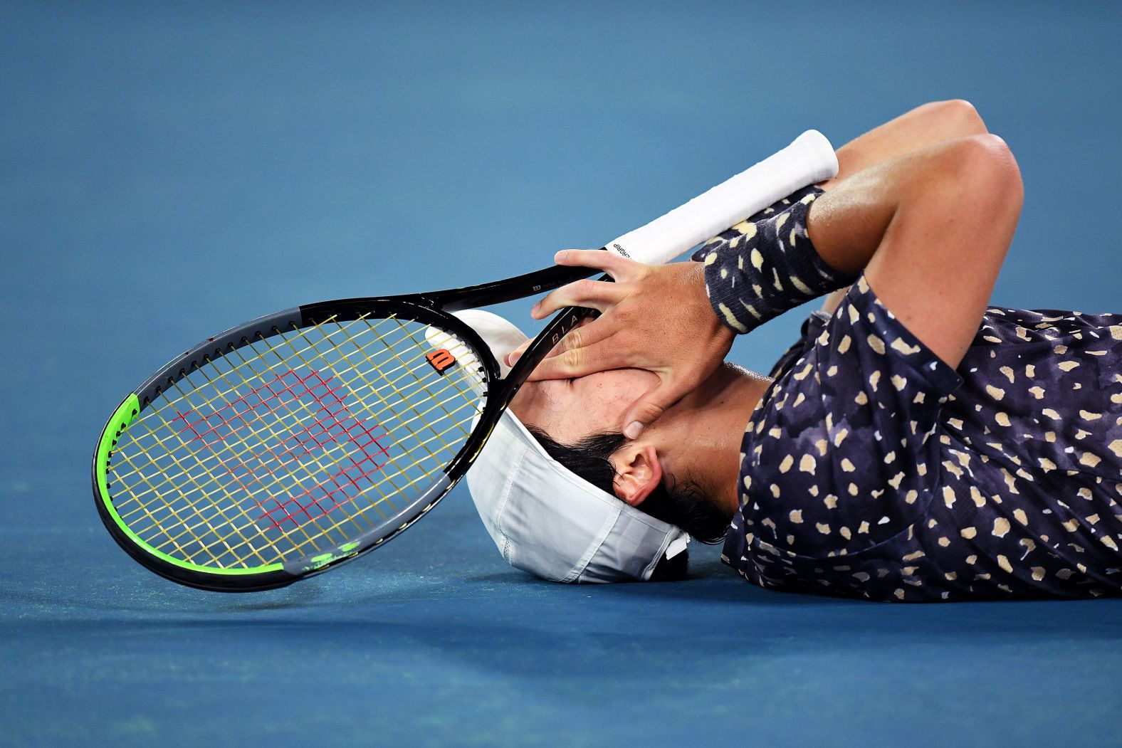France's Harold Mayot reacts to winning the championship point in the junior boys' singles final against France's Arthur Cazaux.
