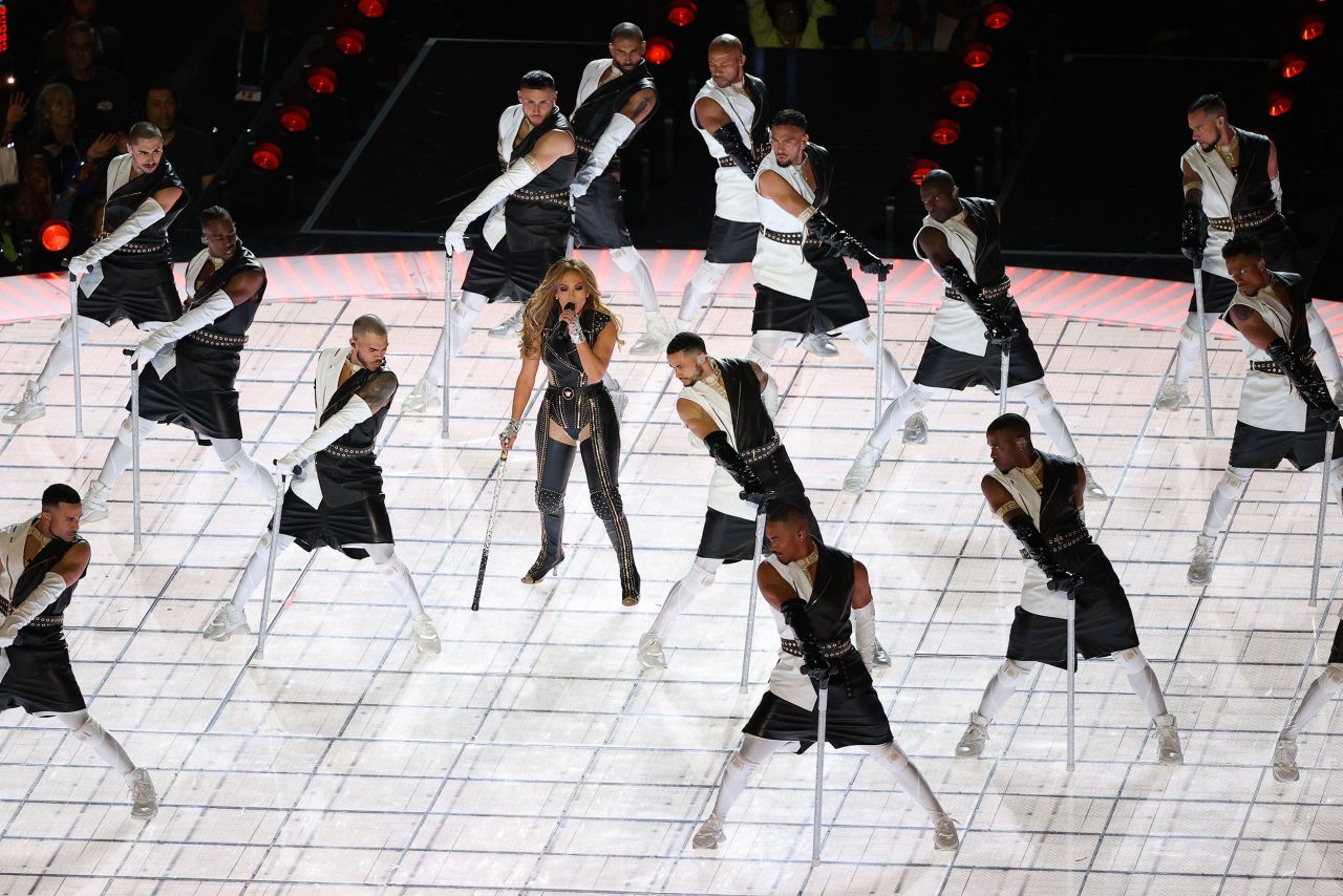 Lopez performs with backup dancers.