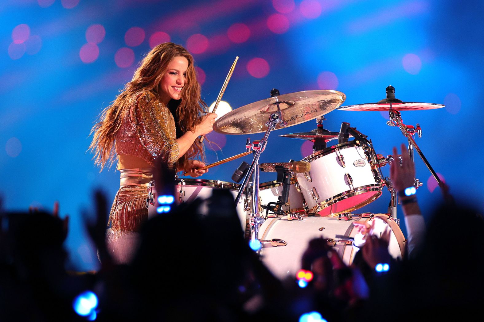 Shakira plays the drums.
