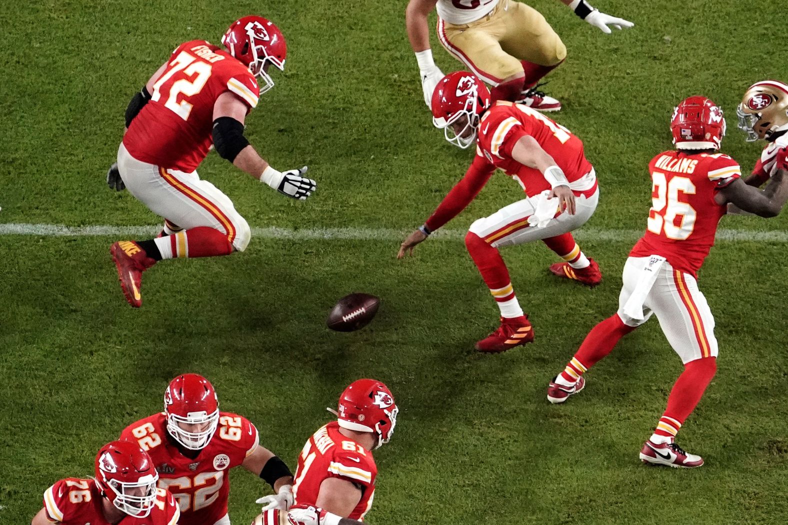 Mahomes looks for the ball after it was knocked out of his hands in the second half.