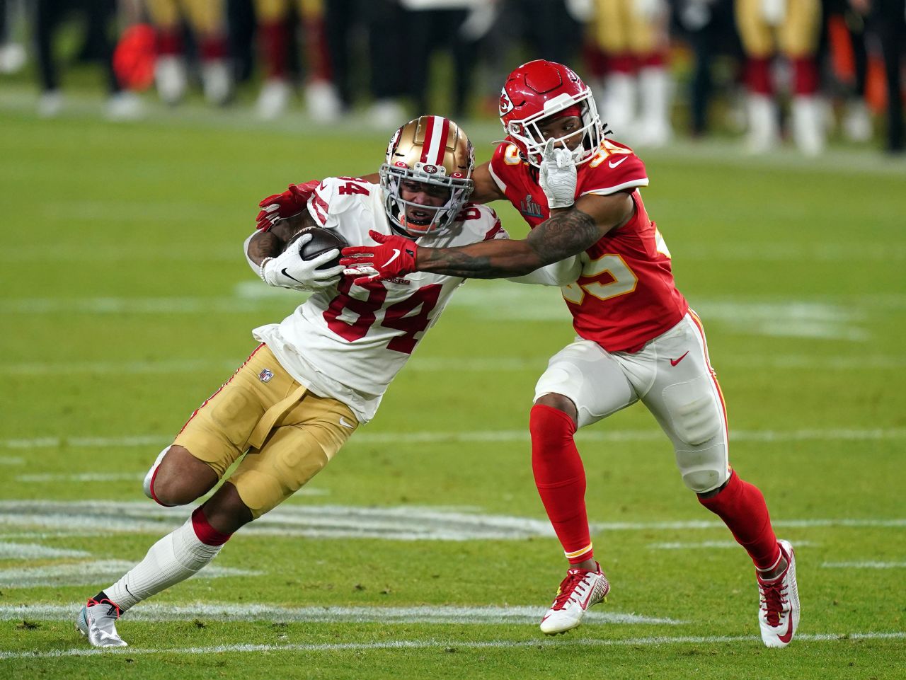 49ers wide receiver Kendrick Bourne is tackled by Chiefs cornerback Charvarius Ward in the third quarter.