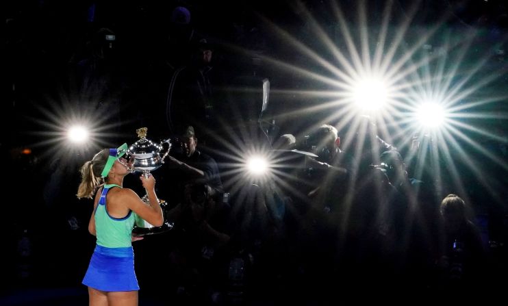 Sofia Kenin kisses her trophy after <a target="_blank">winning the Australian Open</a> on Saturday, February 1. It is the 21-year-old American's first grand slam title.