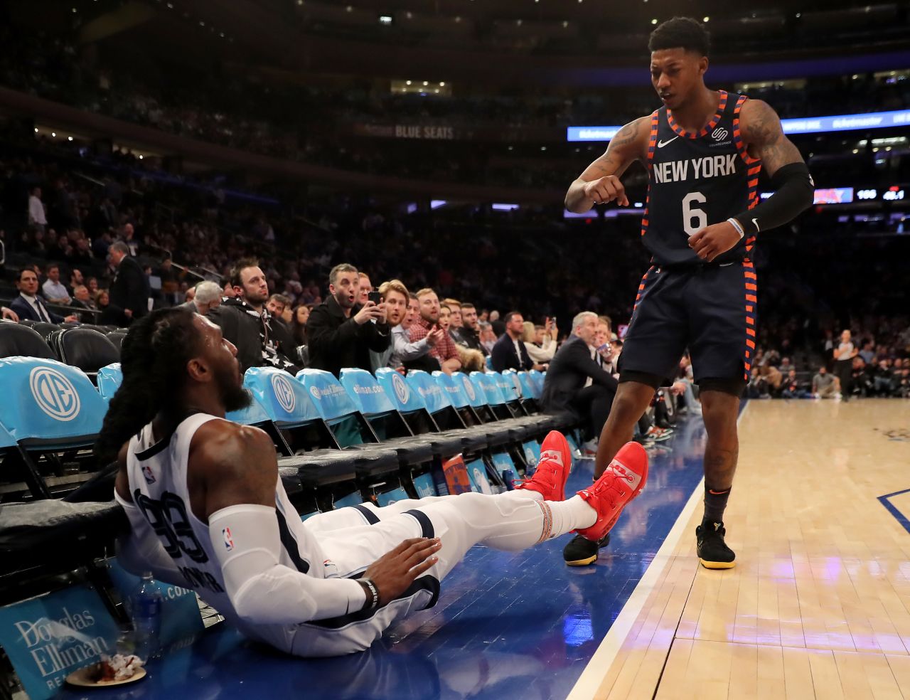 New York's Elfrid Payton shoves Memphis's Jae Crowder during an NBA game in New York on Wednesday, January 29. Payton was upset with Crowder shooting a 3-pointer when the game was already well in hand. Payton was ejected from the game and later suspended by the league.