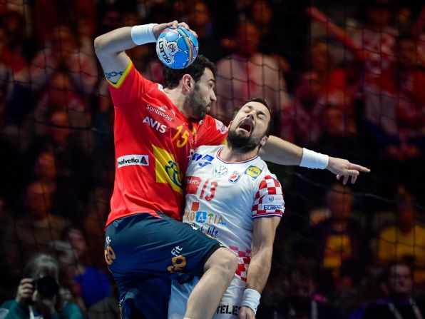 Spain's Iosu Goni Leoz, left, throws near Croatia's Zlatko Horvat during the final of the European Handball Championship on Sunday, January 26. Croatia won 23-19.